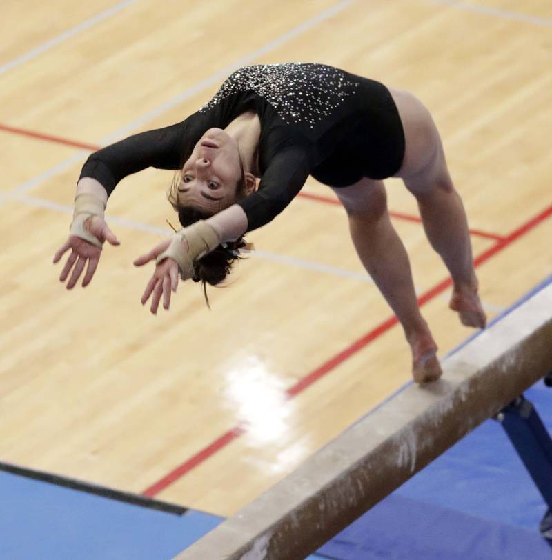 DeKalb’s Madeline Kees competes on the Balance Beam during the IHSA Girls Gymnastics State Finals Saturday February 19, 2022 at Palatine High School.