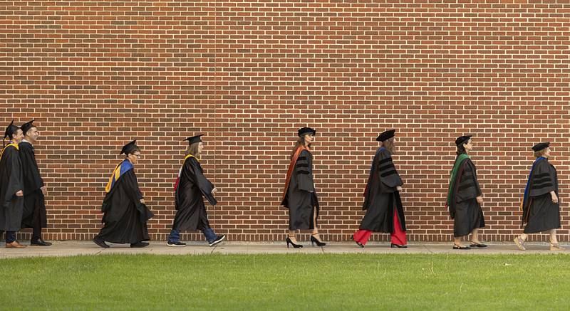 Sauk Valley Community College faculty file into the gymnasium Friday, May 10, 2024 for the 2024 commencement.