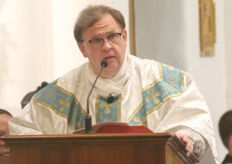 Fr. Gary Blake gives a homily during the final Mass at St. Mary's Church on Thursday, Aug. 15, 2024 in Peru. The church was founded in 1867.