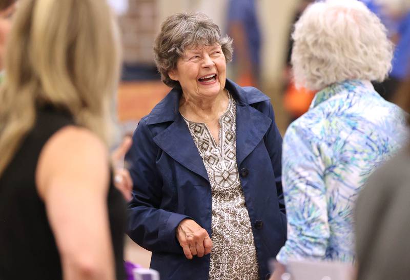 Attendees appeared to have a good time as the visited with vendors and each other during a senior health fair Wednesday, July 12, 2023, at DeKalb High School.