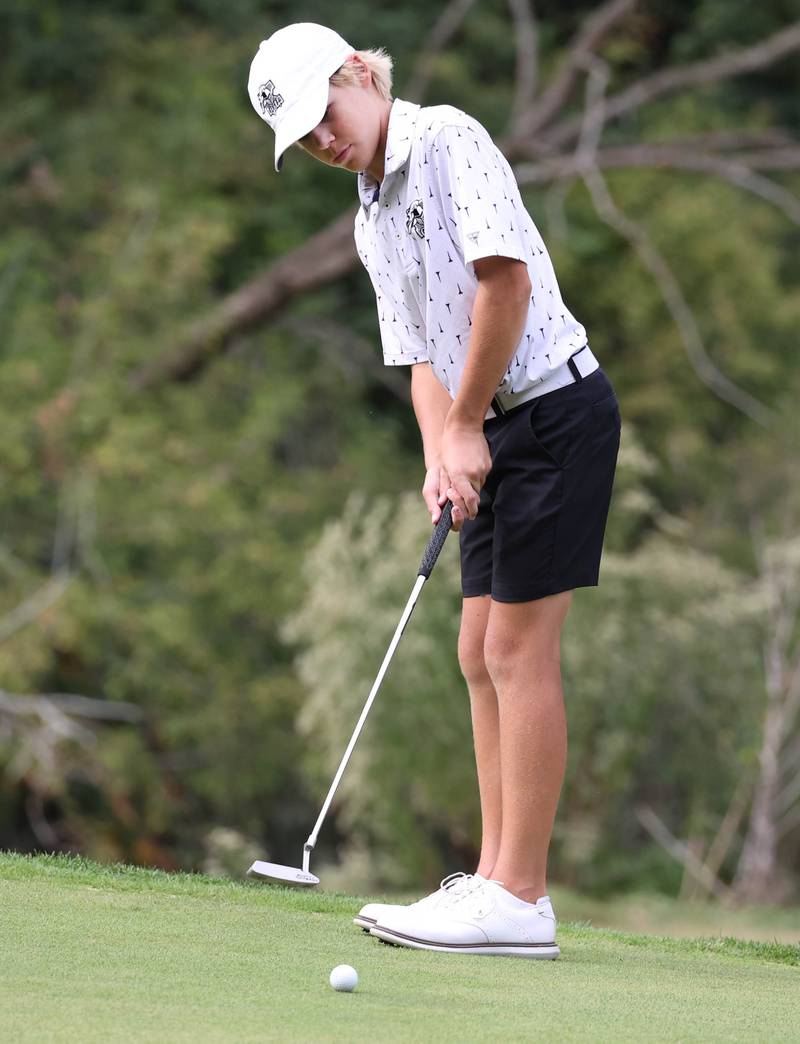 Kaneland’s Dylan Pjesky putts on the second green Monday, Sept. 16, 2024, during the Mark Rolfing Cup at the Kishwaukee Country Club in DeKalb.