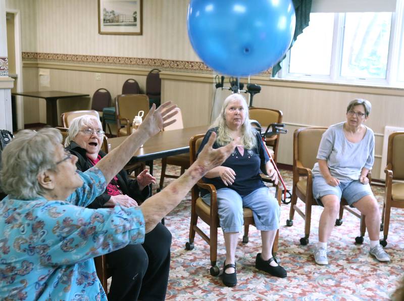 Barb City Manor residents get together for a game of catch Tuesday, July 2, 2024, at the retirement home in DeKalb. Barb City Manor celebrated its 45th anniversary earlier this year.