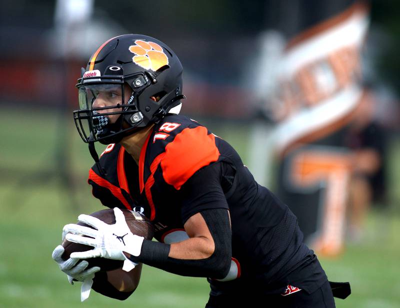 Crystal Lake Central’s Ben Freese runs the ball against Huntley in varsity football on Friday, Aug. 30, 2024, at Metcalf Field on the campus of Crystal Lake Central High School in Crystal Lake.