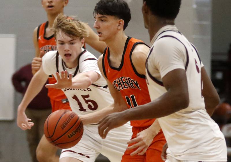 Antioch’s John Majerowski tries to steal the ball from McHenry's Hayden Stone during a nonconference basketball game Thursday, Jan. 4. 2024, at Antioch High School.