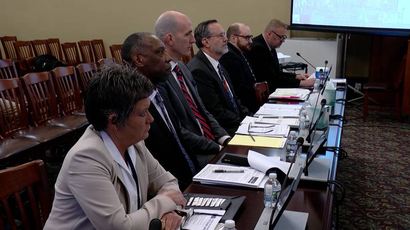 Illinois Department of Veterans’ Affairs Director Terry Prince (third from left) testifies before the Illinois Legislative Audit Commission at the Capitol this week. He was testifying regarding an audit of a deadly COVID-19 outbreak at the LaSalle Veterans Home that killed 36 residents in 2020.