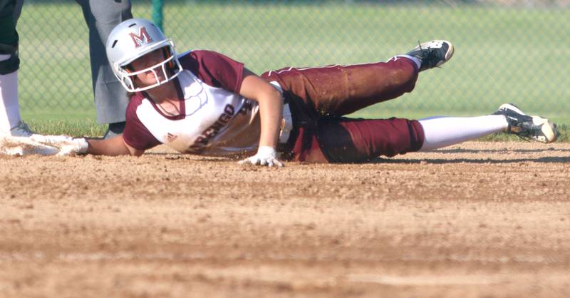 Marengo’s Jozsa Christiansen arrives safely at second base against North Boone in IHSA Softball Class 2A Regional Championship action at Marengo Friday.