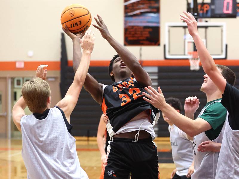 DeKalb’s Justin O'Neal goes up for a shot during their summer game against Elk Grove Tuesday, June 18, 2024, at DeKalb High School.