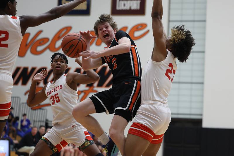 Lincoln-Way West’s Max Gabriel draws the shooting foul against Rich Township in the Class 4A Lincoln-Way West Regional semifinal on Wednesday, Feb. 21st 2024 in New Lenox.