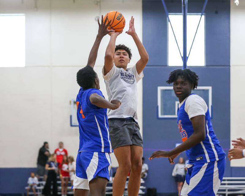 Benet's Blair Fagbemi (3) puts up a shot under the basket at the Riverside-Brookfield Summer Shootout basketball tournament. June 22, 2024.