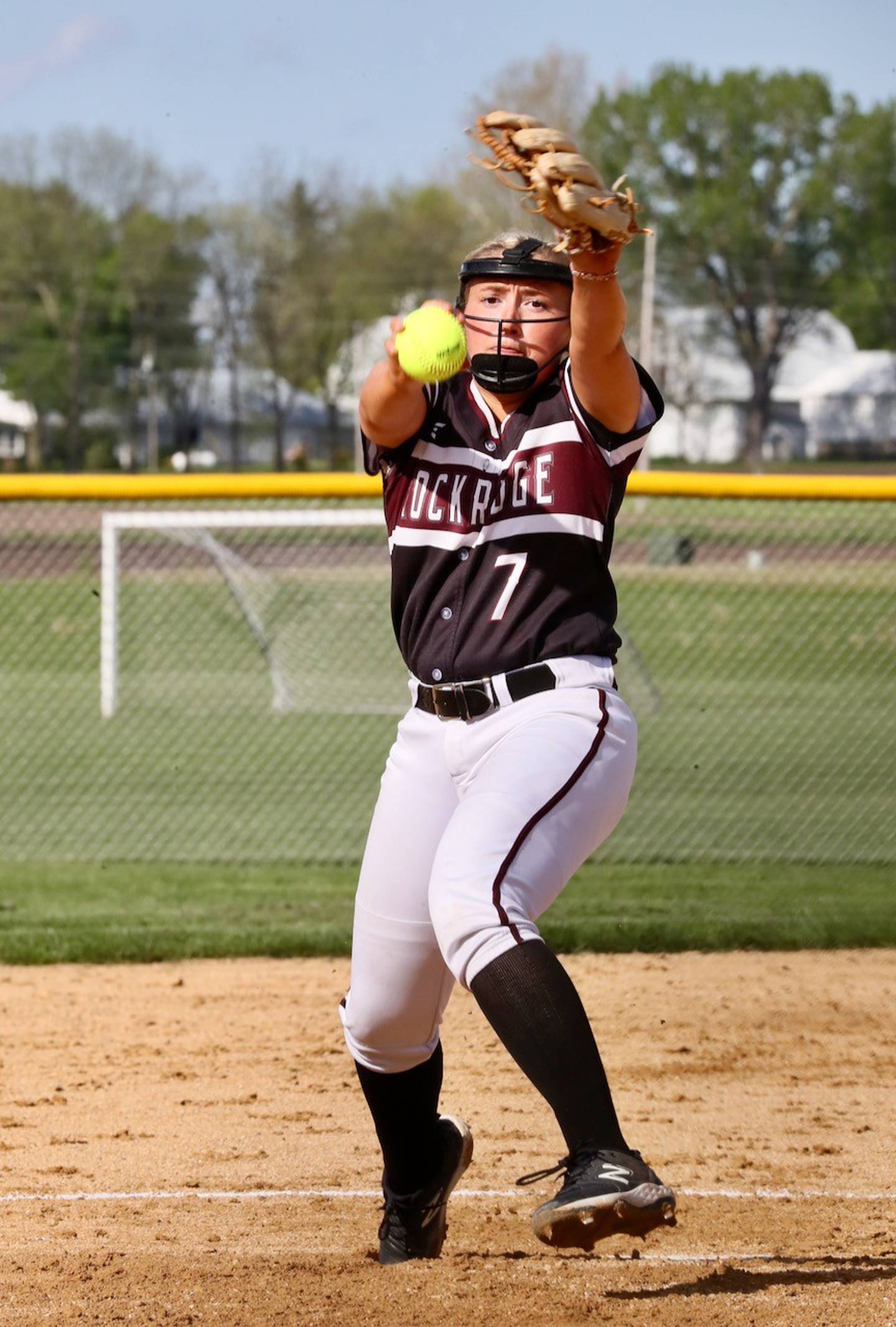 Rockridge's Kendra Lewis makes her pitch against Princeton Tuesday at Little Siberia Field. She will be pitching for the University of Wisconsin next year.