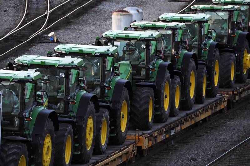 FILE - A consist of John Deere tractors sit in Norfolk Southern's Conway Yard in Conway, Pa., Dec. 5, 2022. Deere & Co. confirmed Monday, July 1, 2024, that it's laying off nearly 600 workers as the farm equipment manufacturer deals with declining demand. (AP Photo/Gene J. Puskar, File)