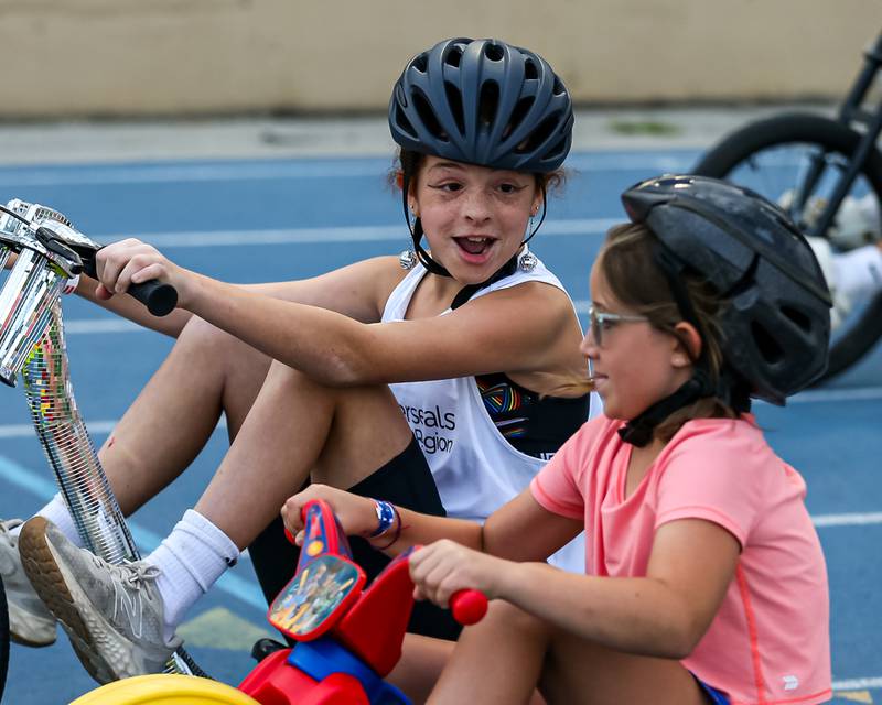 Parker Wujak racing for Easter Seals passes up the competition to win her race during the Great American Big Wheel Race.  July 22nd, 2023