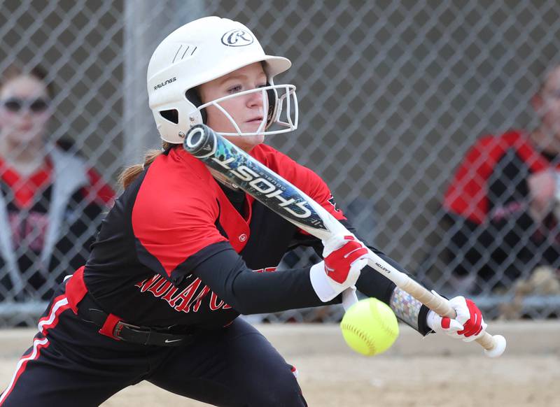 Indian Creek’s McKenzie Greer tries to get a bunt down during their game against Mendota Thursday, March 14, 2024, at Indian Creek High School in Shabbona.