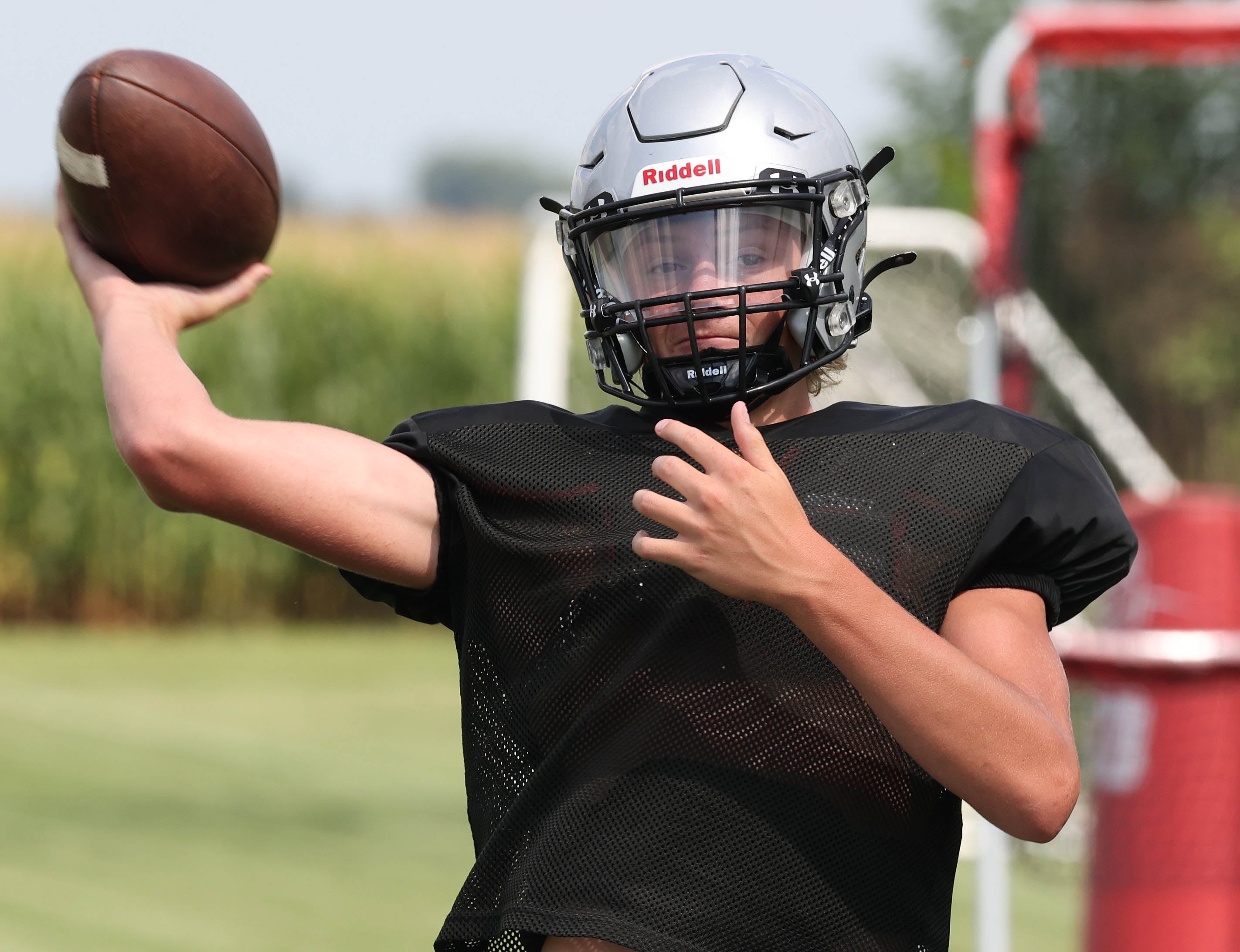 Kaneland’s Chase Kruckenberg throws a pass during practice Friday, Aug. 16, 2024, at the school in Maple Park.