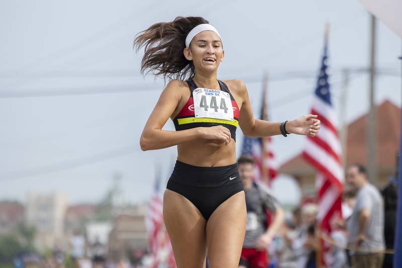 Ari De La Cerda of Milwaukee takes the top women’s prize Saturday, July 1, 2023 at the 23rd annual Reagan Run. De La Cerda clocked in a time of 19:22:49.