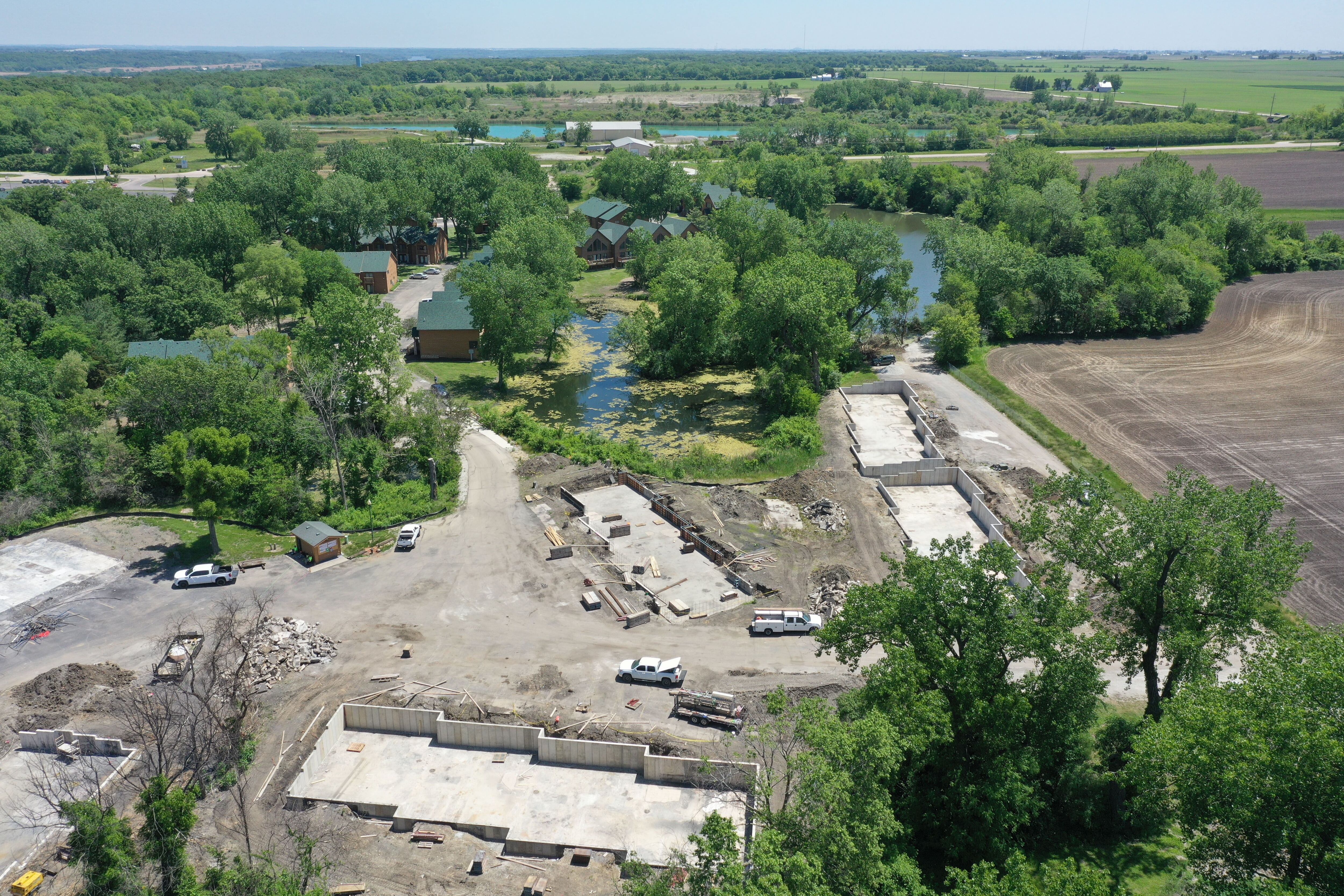 An aerial view of the site where a major fire broke out one year earlier Grand Bear Resort at Starved Rock. Foundations have been poured and crews are beginning to rebuild after the fire.