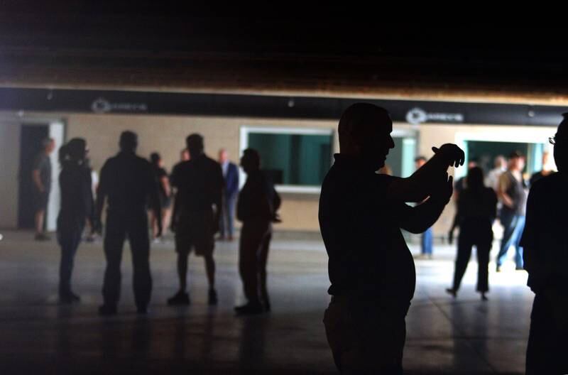 People check out the firing range during an open house at The McHenry County Regional Training Center in Cary Tuesday evening.