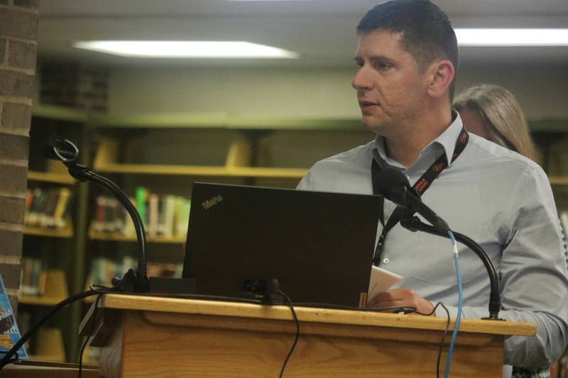 Armir Doka, the district's co-director of business and finance, speaks at an April 18, 2023 meeting of the DeKalb School District 428 Board of Education.