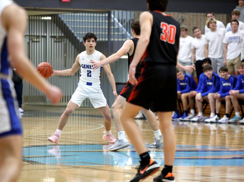 Geneva’s Gabe Jensen looks to pass the ball during a Class 4A Willowbrook Regional semifinal game against Wheaton Warrenville South on Wednesday, Feb. 21, 2024.