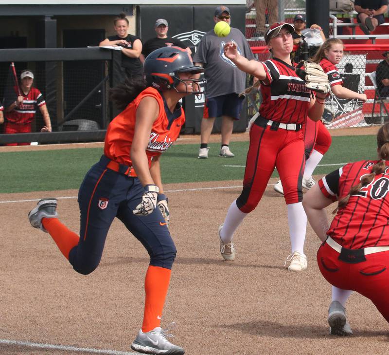 Yorkville's Madi Reeves throws out Oak Park-River Forest's Kelly Cortez while running to first base during the Class 4A State semifinal softball game on Friday, June 9, 2023 at the Louisville Slugger Sports Complex in Peoria.