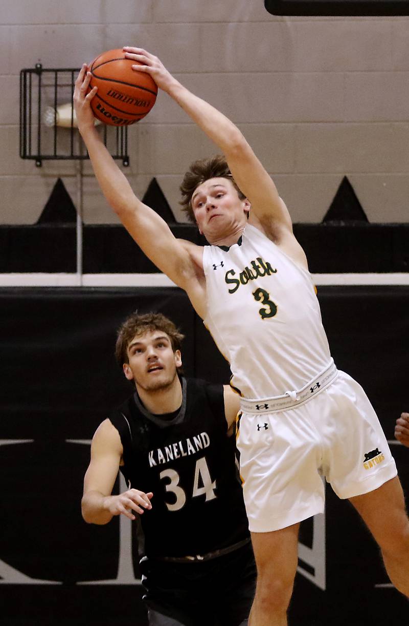 Crystal Lake South's Colton Hess grabs a rebound in front of Kaneland's Parker Violett during the IHSA Class 3A Kaneland Boys Basketball Sectional championship game on Friday, March 1, 2024, at Kaneland High School in Maple Park.
