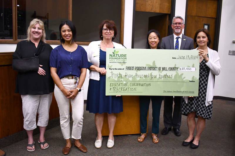 Picture from left to right are Forest Preserve District Board President Annette Parker; Board Commissioners Elnalyn Costa and Jackie Traynere; Nature Foundation Executive Director Tara Neff; Forest Preserve Executive Director Ralph Schultz; and Board Commissioner Julie Berkowicz on June 13, 2024.