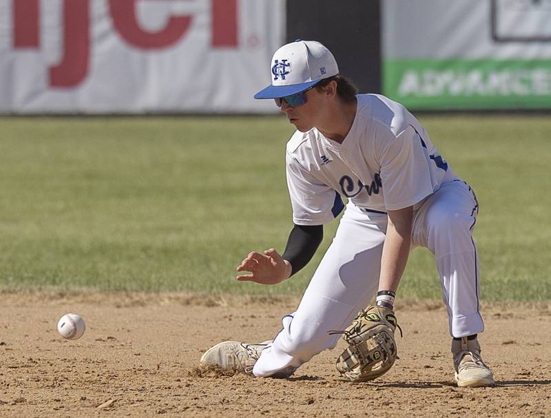 Newman’s Liam Nicklaus scoops a ball at second against Chicago Hope Monday, May 27, 2024 during the Class 2A super-sectional in Rockford.