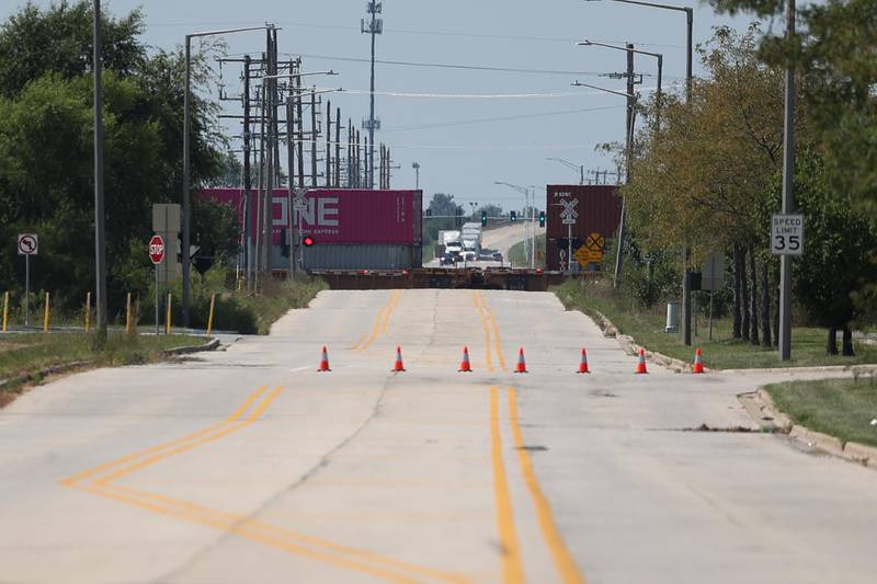 Traffic is diverted as a train blocks Millsdale Road at the intersection of Brandon Road on Thursday, Sept. 5, 2024 in Elwood.