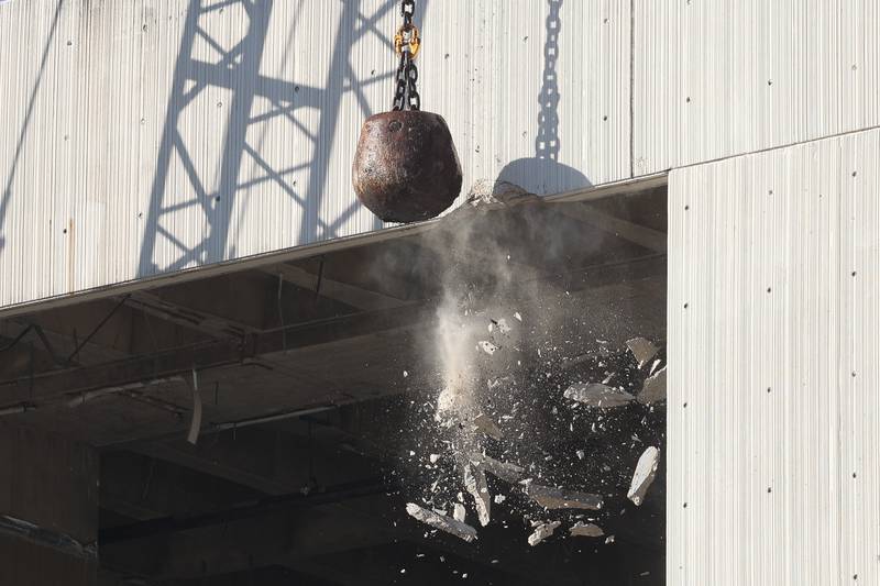 A wreaking ball takes its first swing for the external demolition of the old Will County Courthouse on Friday, Feb. 9th 2024 in Joliet.