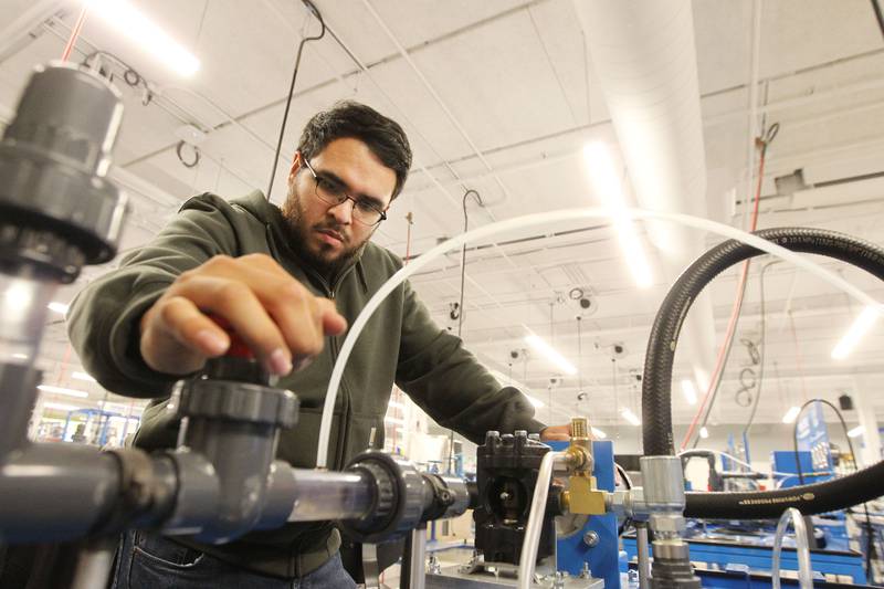 Moises Garcia, of Round Lake works on his centrifugal pumps lab using a pump system trainer at the College of Lake County Advanced Technology Center (ATC) on November 16th in Gurnee.
Photo by Candace H. Johnson for Shaw Local News Network