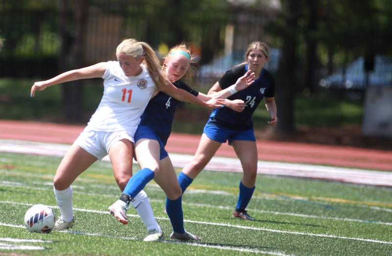 Crystal Lake Central’s Maddie Gray (left) and Burlington Central’s Rylee Butler go after the ball during the Class 2A state semifinal game at North Central College in Naperville on Friday, May 31, 2024.