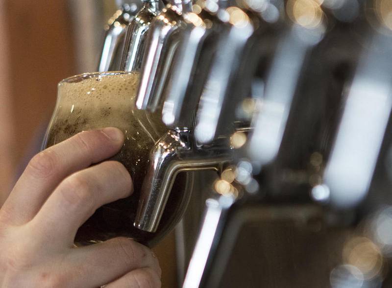 Head pourer John Sanderson pours a tulip glass fill of Diamond Dust on Friday, March 17, 2017 at Forge Brewhouse in Sycamore.  Diamond Dust is one of two brews which Sanderson will be pouring at the inaugural Barb City Brewfest on Saturday, March 25.