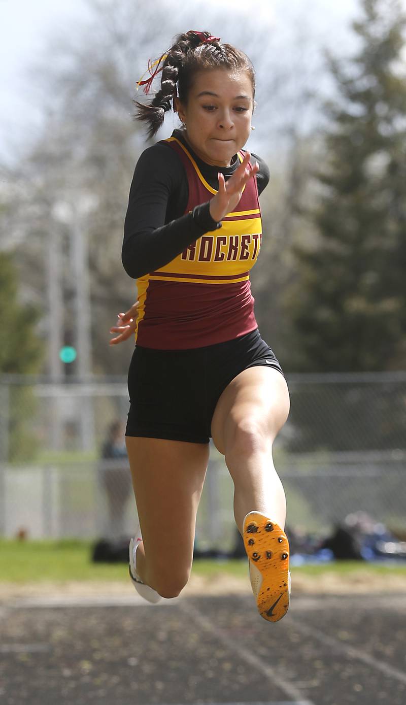 Richmond-Burton’s Angelina Gersch competes in the girls triple jump Friday, April 21, 2023, during the McHenry County Track and Field Meet at Cary-Grove High School.