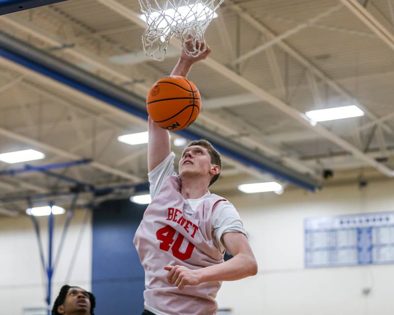 Benet's Colin Stack (40) dunks at the Riverside-Brookfield Summer Shootout basketball tournament in June 2024.