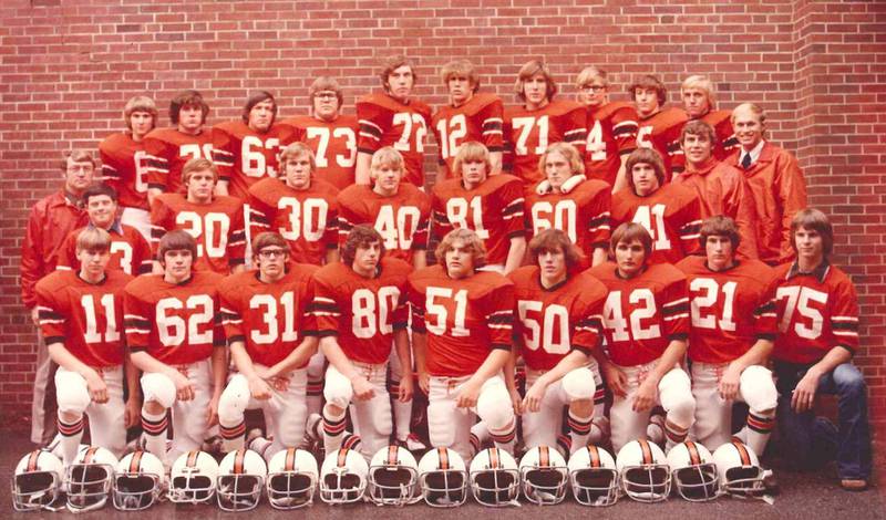 The 1974 Class 1A state football champion Flanagan Falcons – Front row, left to right, Mark Harms, Richard Hillman, Rodney Bertsche, Larry Bertsche, Phil Yordy, Kevin Anderson, Tim Kruger, Steve Cray and manager Scott Birkey. Middle row, left to right, Head Coach Roger Zehr, manager Dirk Anderson, Kevin Bertsche, Gregg Gundy, Kent Schwerin, Brent Rocke, David Anderson, Curt Roeschley, assistant coach Roger Smith and assistant coach Harry Park. Back row, left to right, Todd Birkey, Maurie Duffy, Roger Smith, John McDowell, Pat Renken, Jim Braksick, Jim Knight, Doug Saxton, Greg Albertson and Alan Collins.