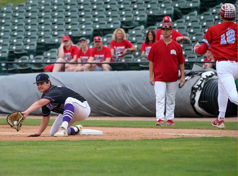 Wilmington's Joe Allgood catches the ball at first base to force out St. Anthony's Brady Hatton during the Class 2A State semifinal game on Friday, May 31, 2024 at Dozer Park in Peoria.