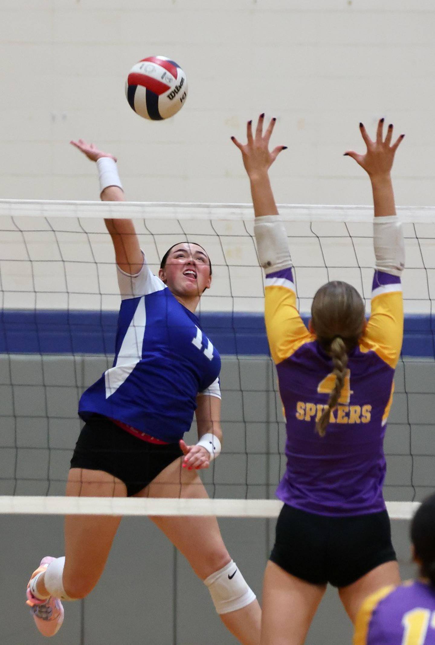 Princeton's Keely Lawson winds up for a hit against Mendota's Laylie Denault Tuesday night at Prouty Gym.