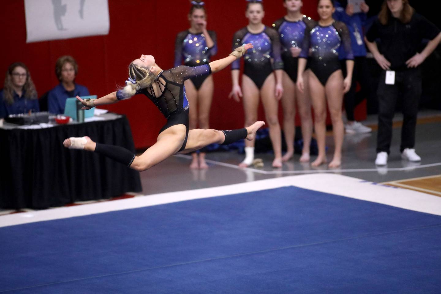 Wheaton Warrenville South’s Haylie Hinckley competes on the floor exercise during the IHSA Girls State Gymnastics Meet at Palatine High School on Friday, Feb. 16, 2024.