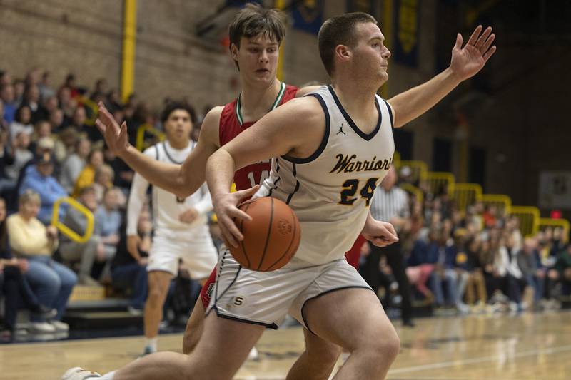 Sterling’s Lucas Austin drives the baseline against LaSalle-Peru Friday, Feb. 23, 2024 during a class 3A regional final at Sterling High School.