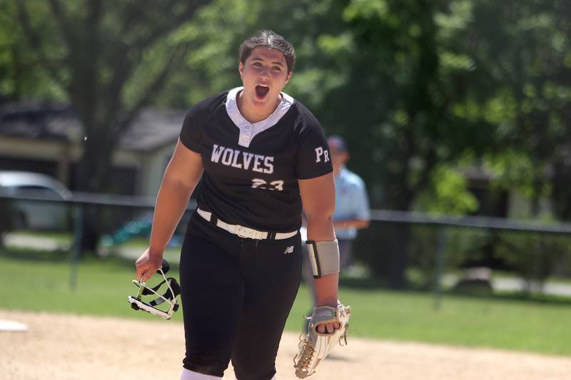 Prairie Ridge’s Reese Mosolino celebrates the final out of a win over Harvard during Class 3A softball regional final action at Lions Park in Harvard Saturday.