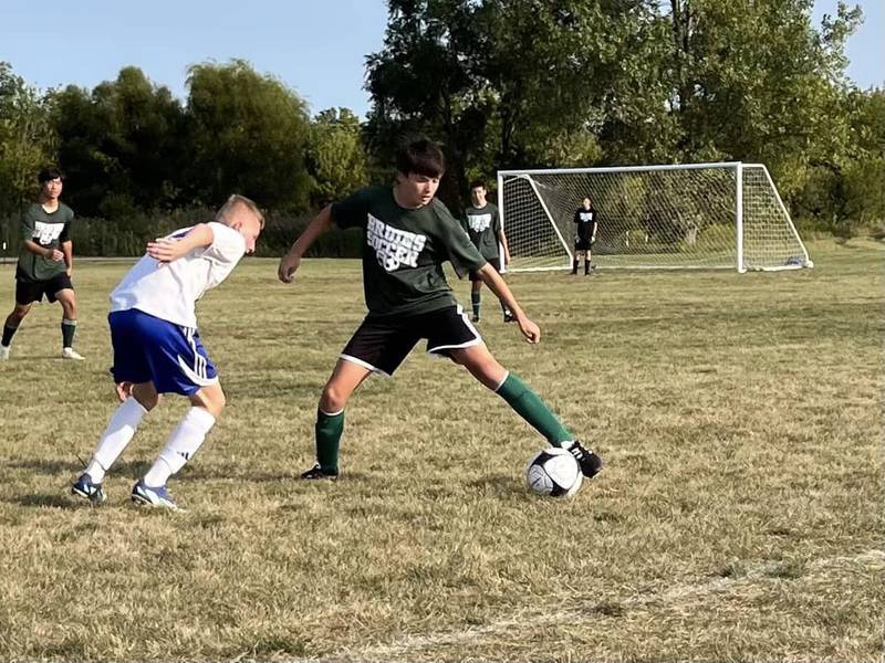 A St. Bede player looks to control the ball during the Bruins' first game against Somonauk at Rotary Park in La Salle.