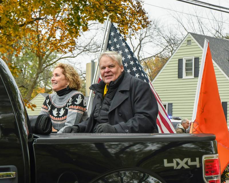 Sycamore Mayor Steve Braser and his wife Beth Braser, take part in the Sycamore Pumpkin Festival parade that went through downtown Sycamore on Sunday Oct. 29, 2023.