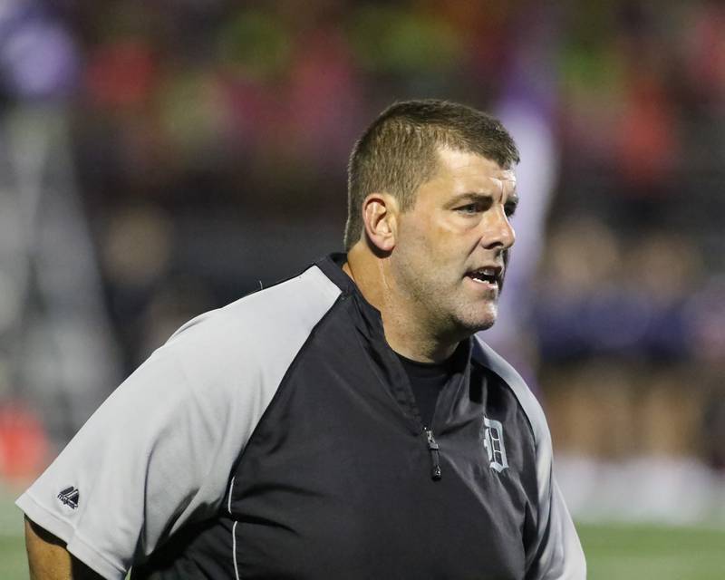 Downers Grove North head coach Joseph Horeni addresses the team before football game between Glenbard West at Downers Grove North on Friday, Sept 13th, 2024  in Downers Grove.