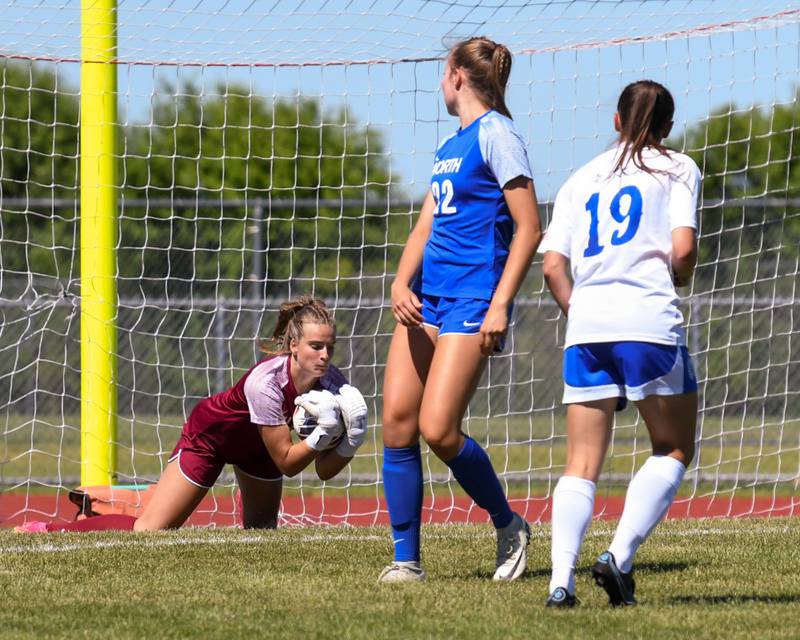 Wheaton North's goalkeeper Zoey Bohmer makes a save during the sectional title game held at South Elgin High School on Saturday May 25, 2024.