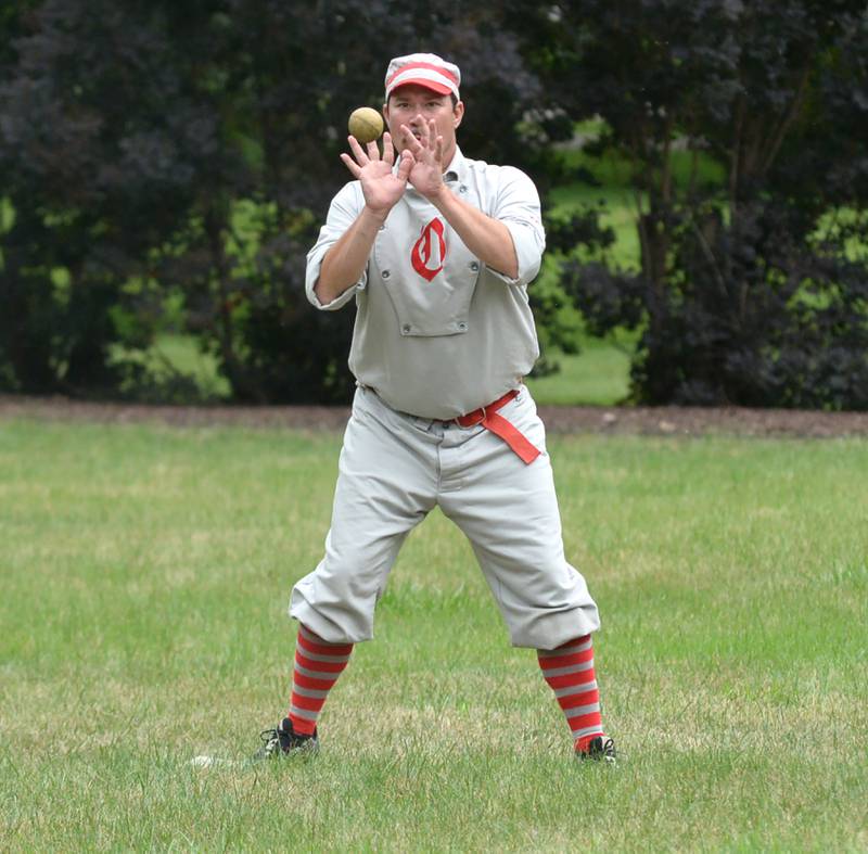 Ganymede Justin "Butter" Early fields a throw to second during a vintage base ball game against the DuPage Plowboys at the John Deere Historic Site in Grand Detour on Saturday, June 8, 2024.