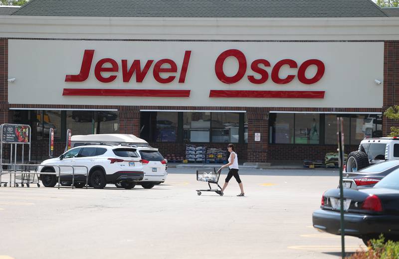 A shopper leaves Jewel on Tuesday, July 30, 2024 in Joliet.