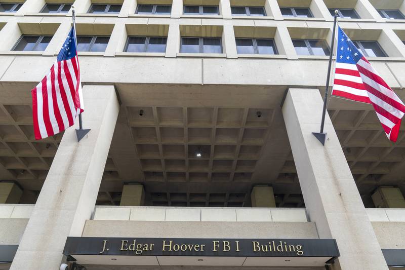 FILE - The J. Edgar Hoover FBI Building is seen June 9, 2023, in Washington. New FBI statistics show violent crime in the U.S. dropping again last year, continuing a downward trend after a pandemic-era spike. (AP Photo/Alex Brandon, File)