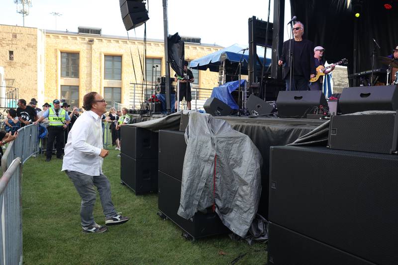 Jim Belushi dances to the performance of Curtis Salgado, the inspiration behind John Belushi's creation of the Blues Brothers characters, at Blues Brothers Con: The Sequel on Saturday, Aug. 17, 2024 at the Old Joliet Prison.