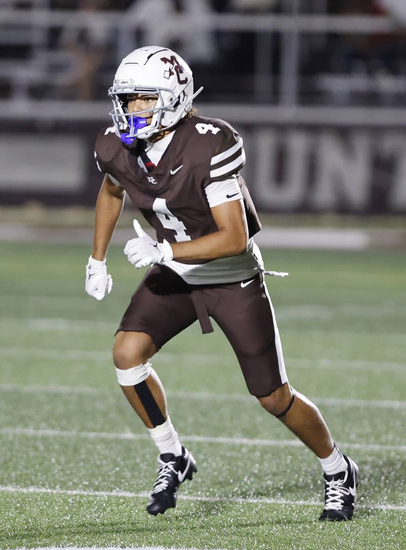 Mt. Carmel's Quentin Burell (4) runs down field during the varsity football game between Nazareth Academy and Mt. Carmel high school on Friday, Sep. 13, 2024 in Chicago.