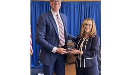 Illinois State Treasurer honors Lockport District 205 administrator at luncheon